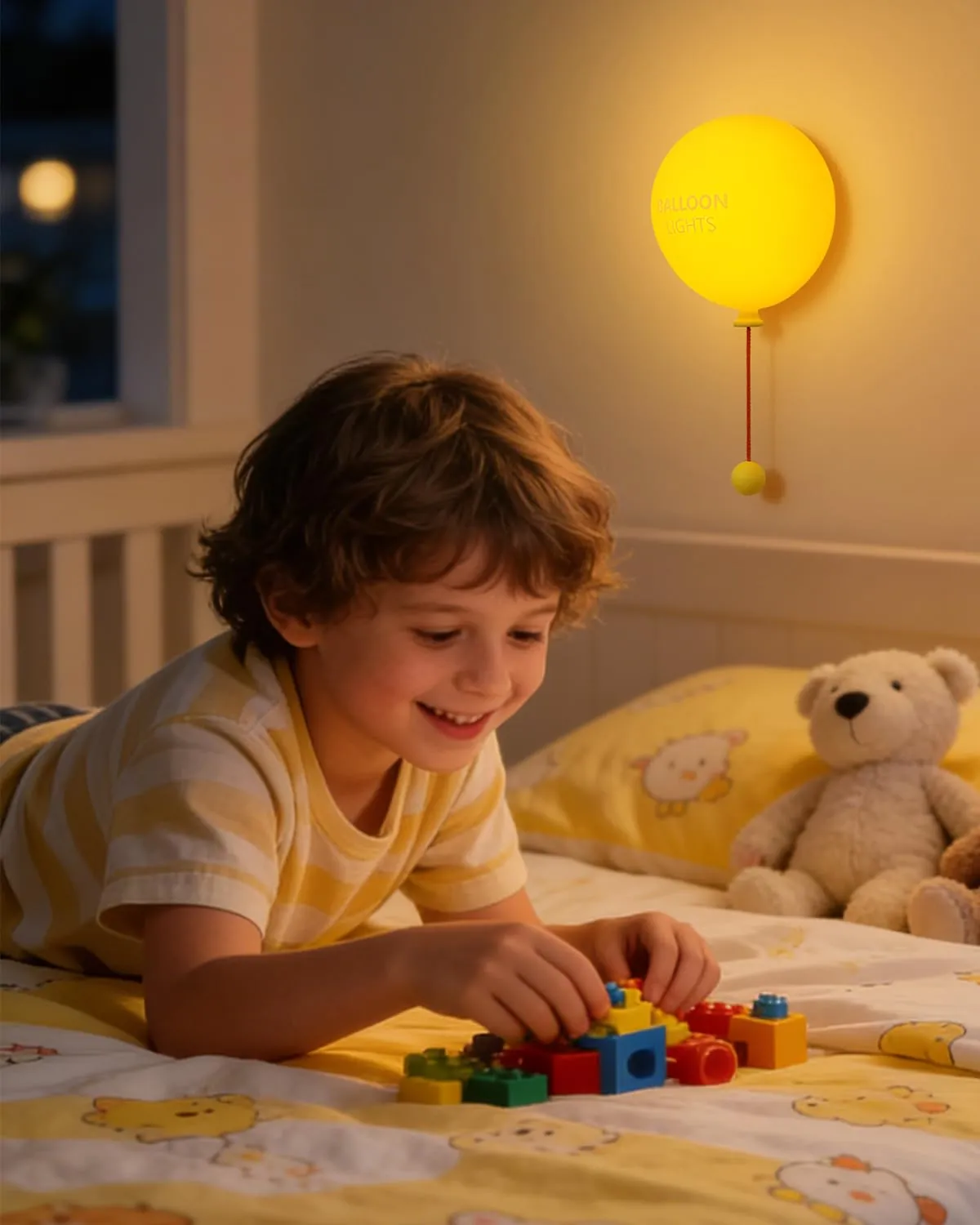 Balloon wall light in a warm children’s play corner